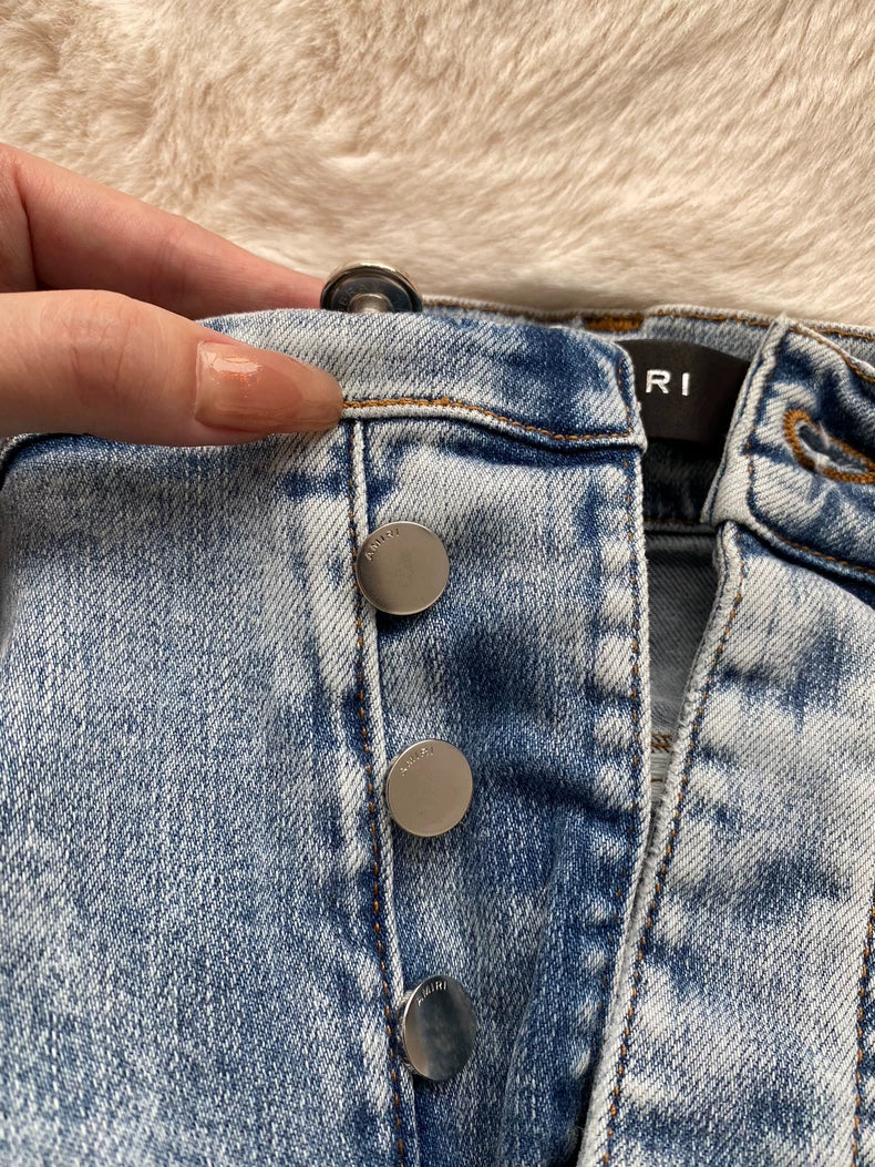 Amiri Light Wash Distressed Denim Jeans