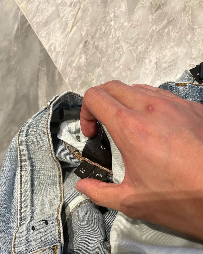 Amiri Light Blue Denim Pants with Distressing