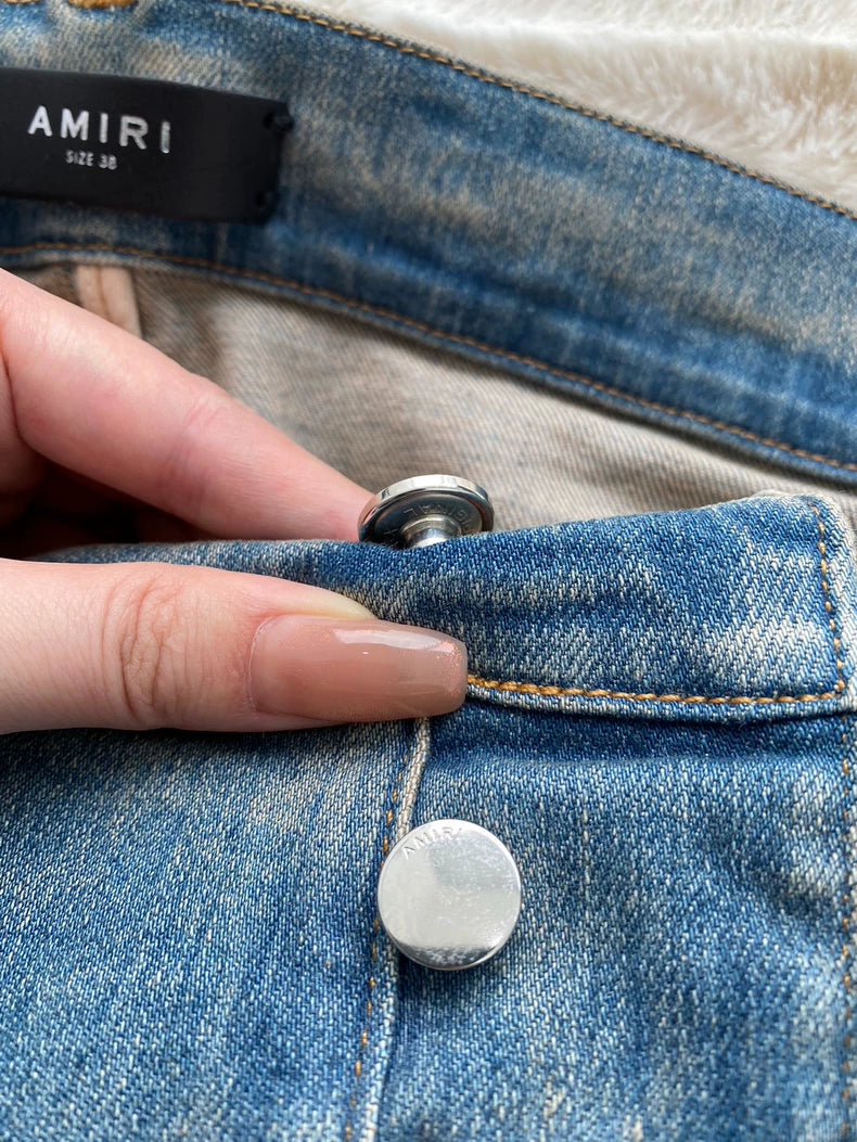 Amiri Logo Patch Distressed Denim Pants