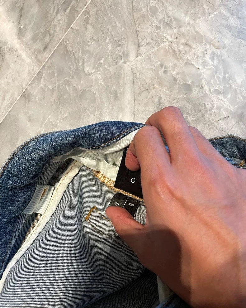 Amiri Blue Watercolor Denim Thrash MX1 Pants