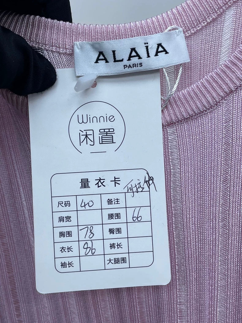 Pink Knit Dress with Ruffled Skirt