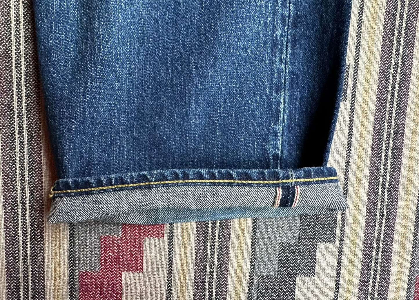 fdmtl slim fit denim with repair patches