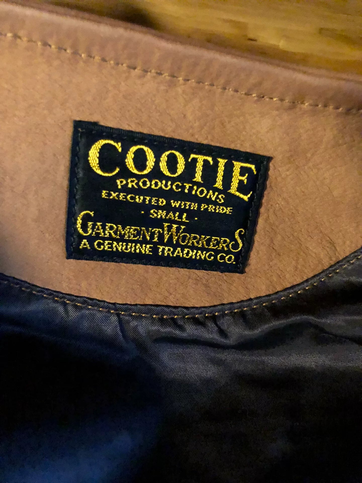 cootie leather utility vest in golden brown