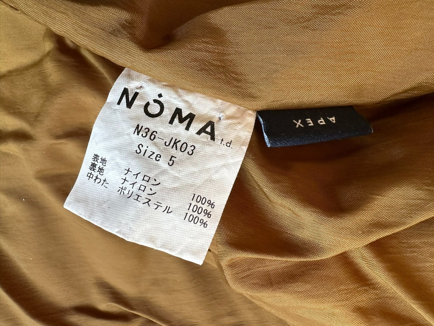 hand dyed puffer jacket in warm tones