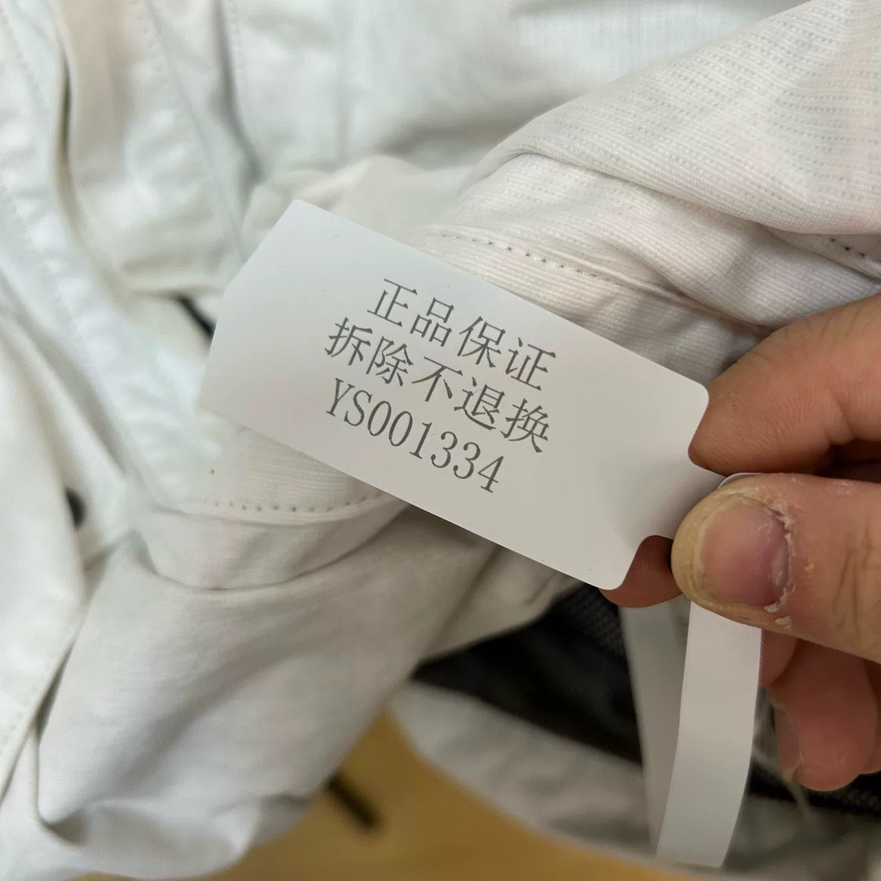 stone island white label jacket for outdoor use