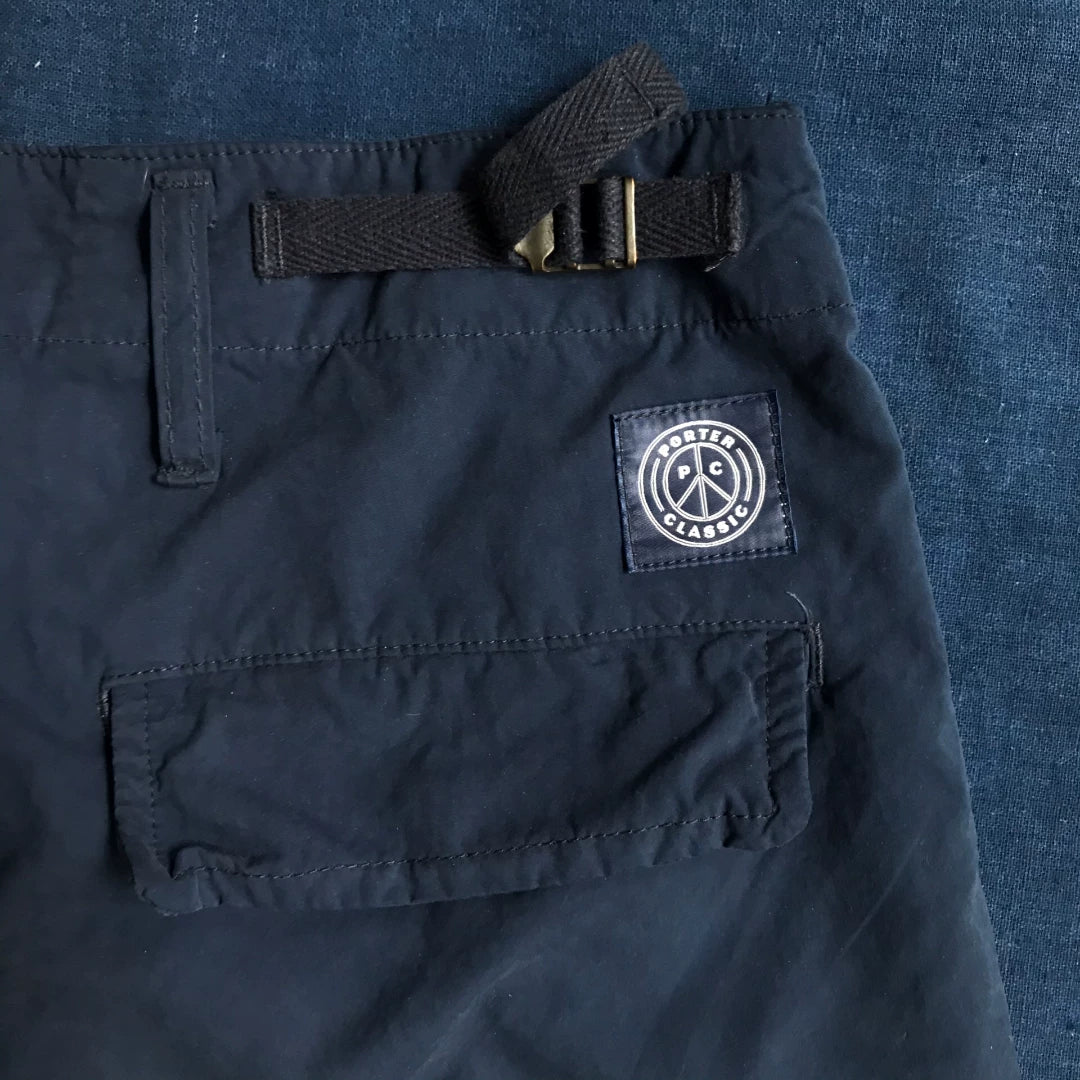 porter classic weather cargo pants in blue