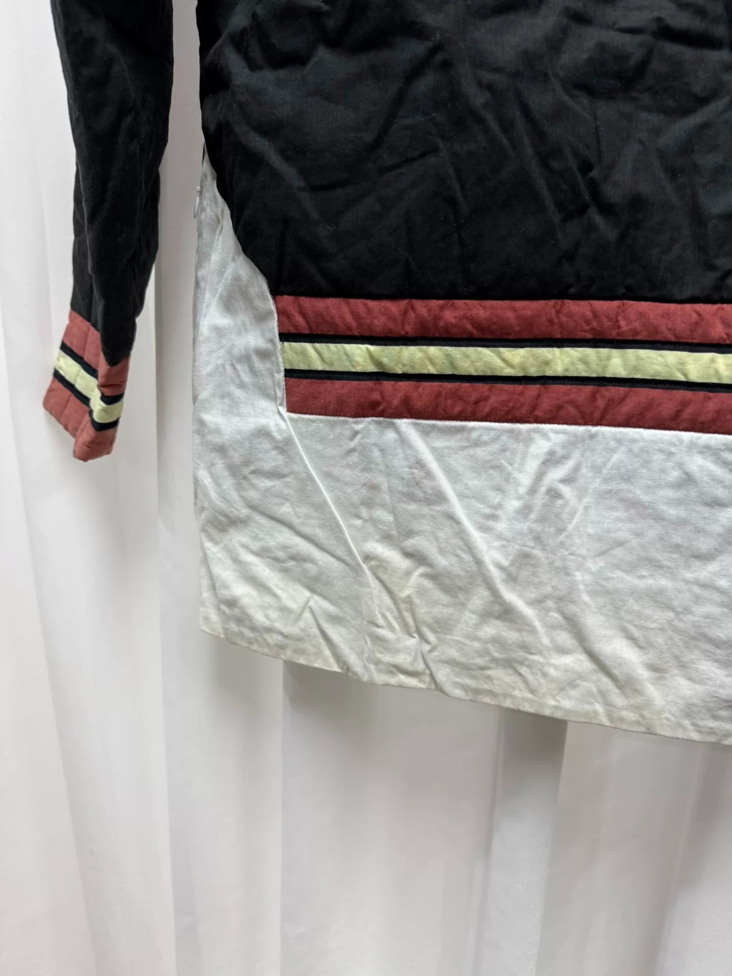 undercover bomber jacket with red accents