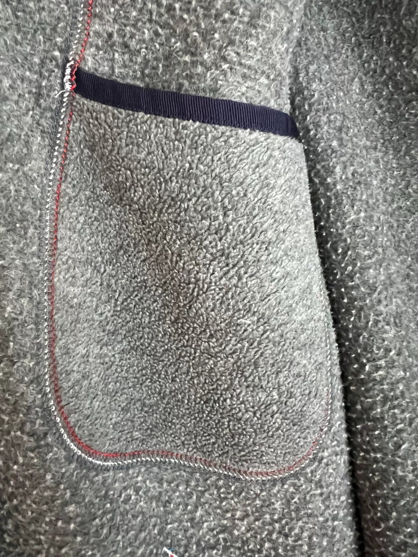 stylish gray fleece jacket with blue accents