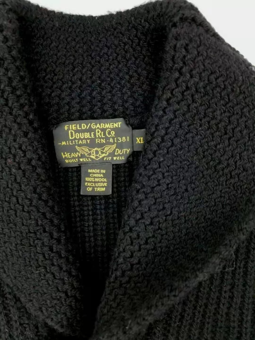 black chunky wool sweater with quilted patches