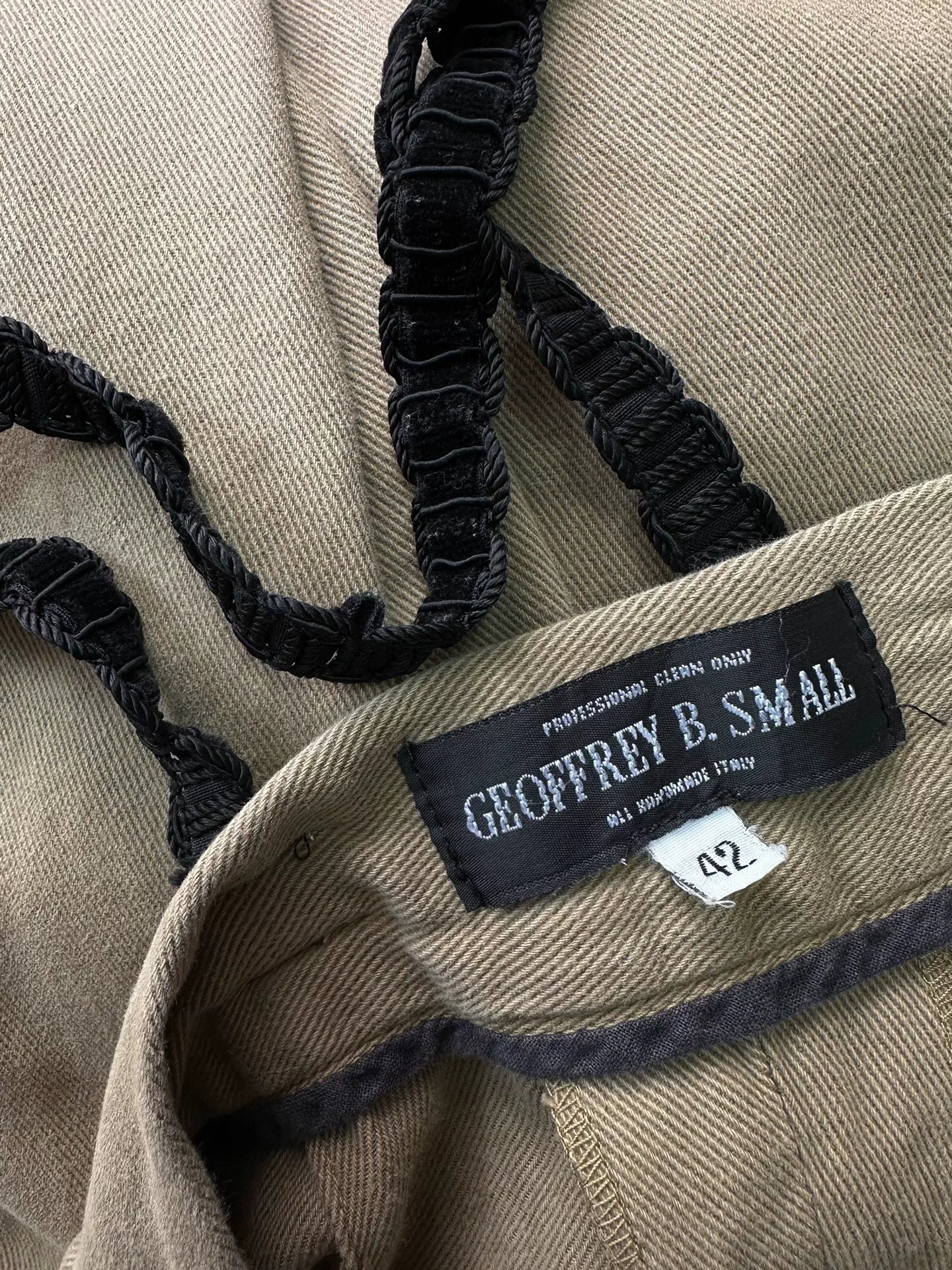 beige velvet overalls with silver buckles