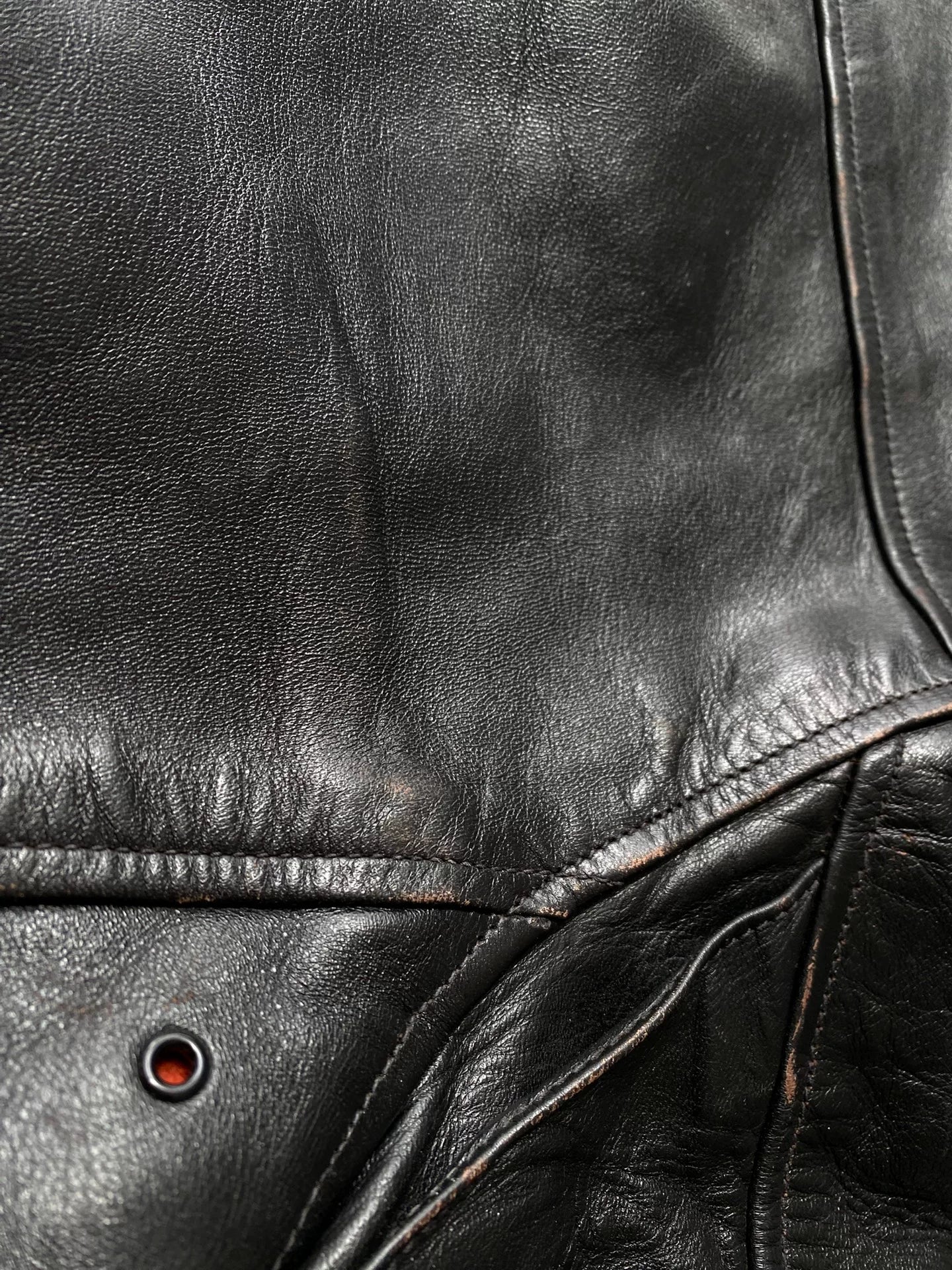 black leather jacket with snowflake design