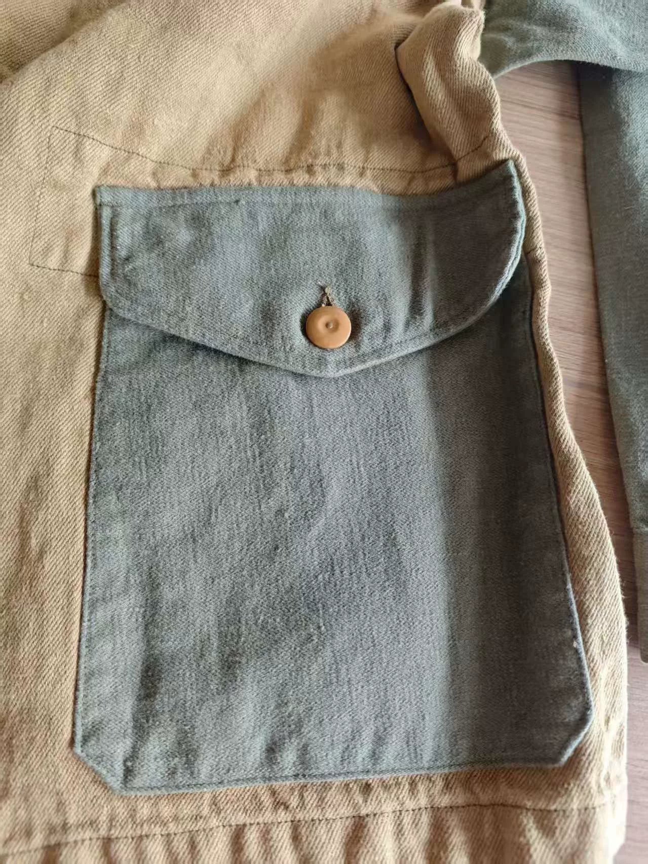 vintage military-style denim jacket