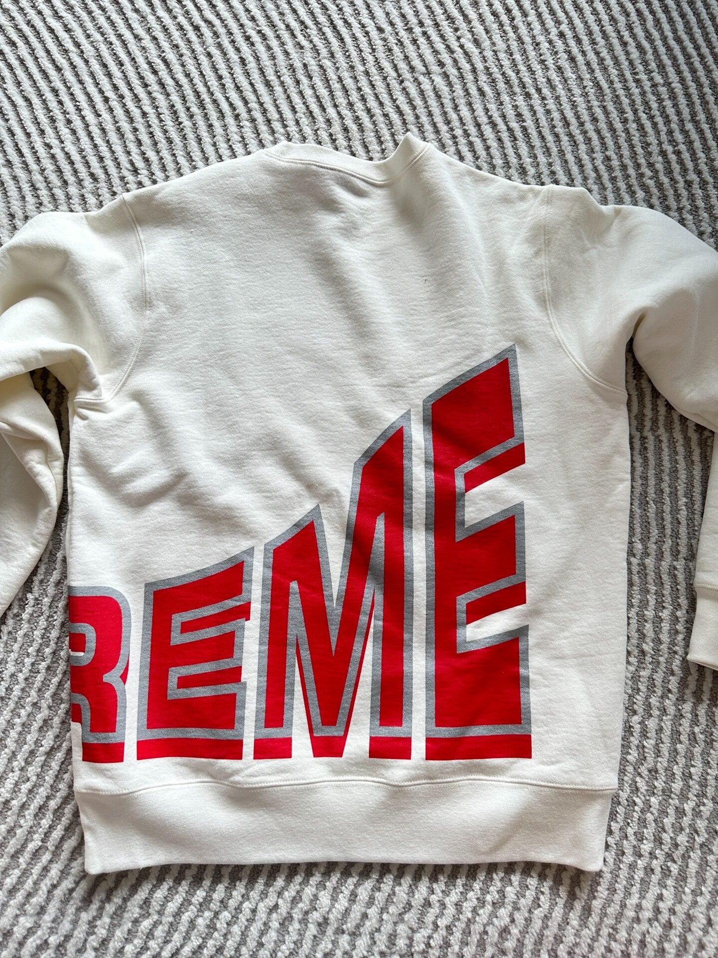 supreme sweatshirt in white with red logo