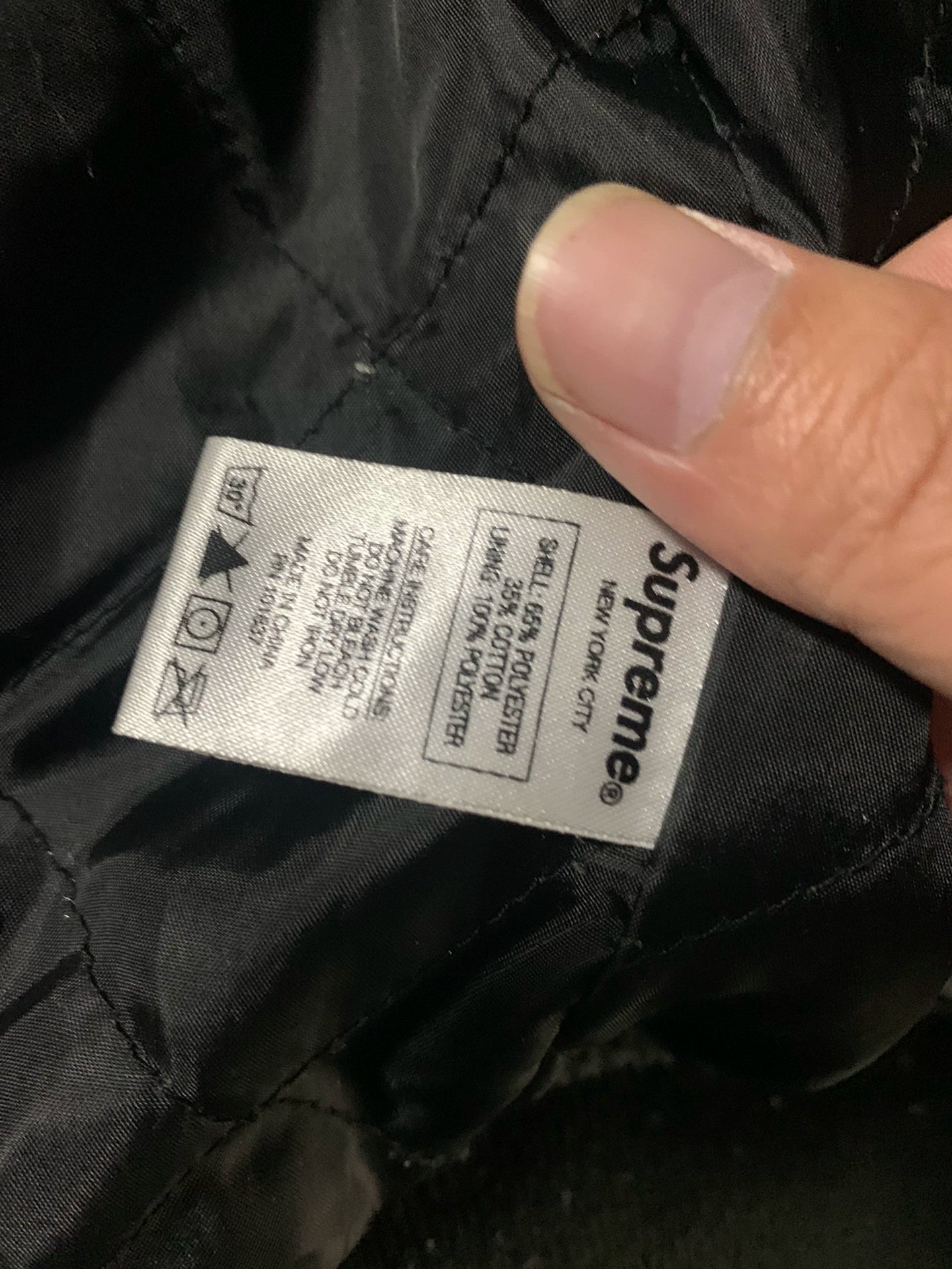 supreme black jacket with colorful embroidery