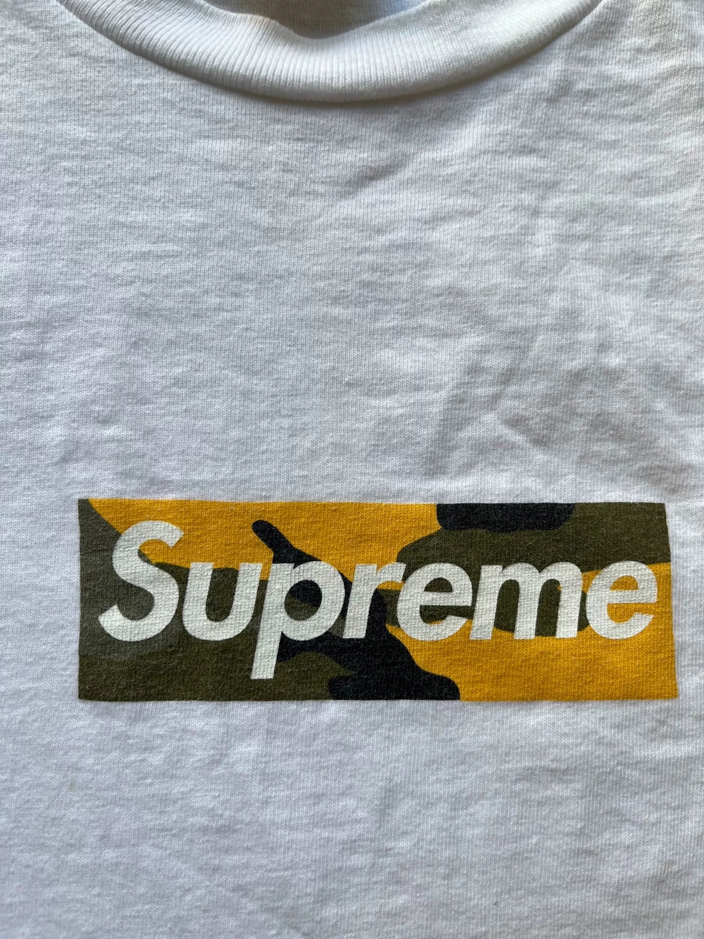 supreme box logo tee in orange color