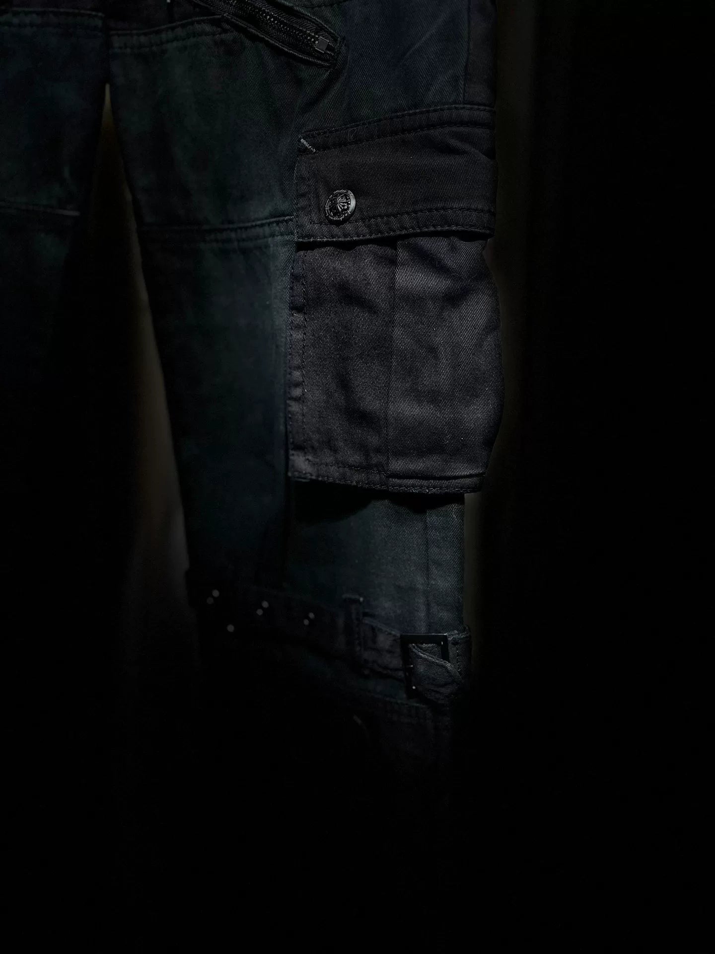 dark avant-garde cargo pants with zippers