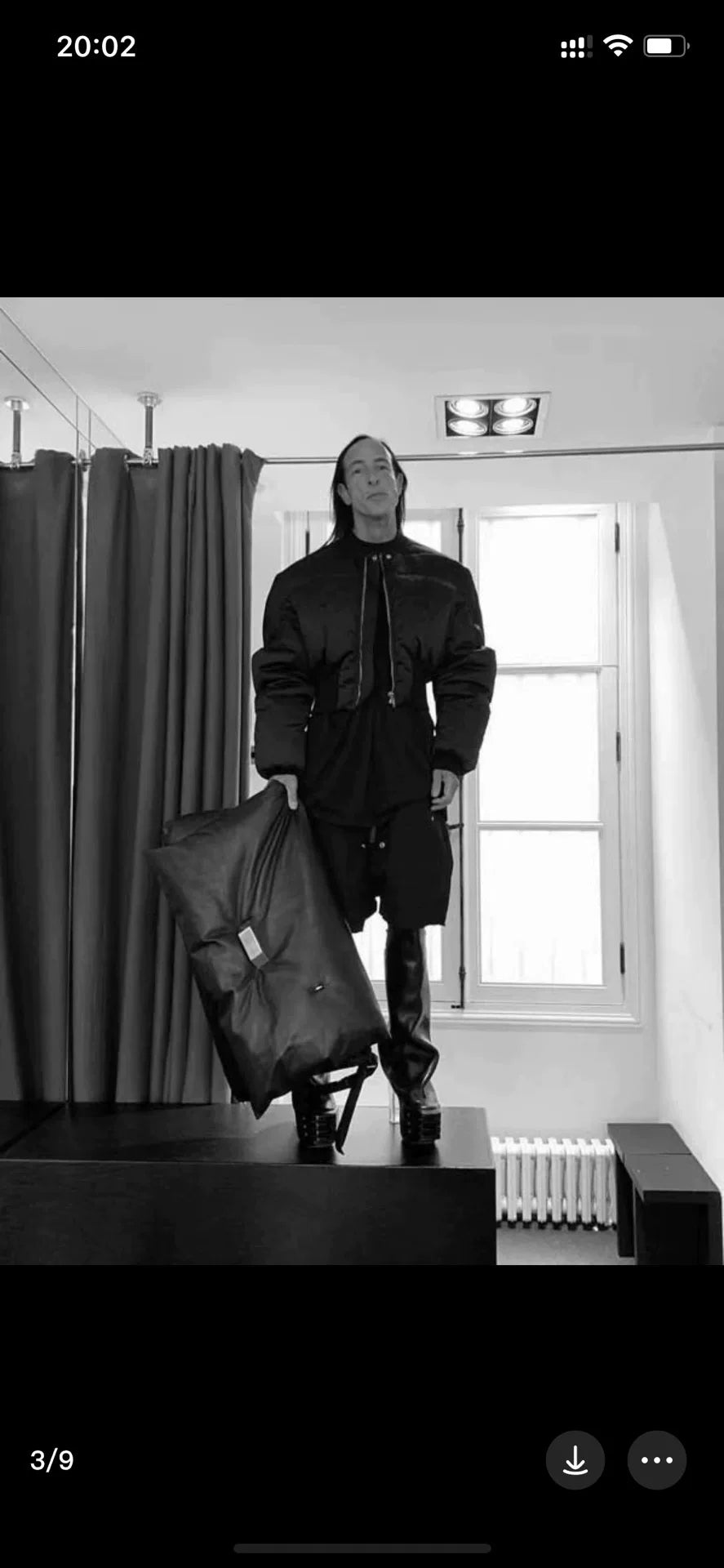 oversized black puffer jacket with waist tie