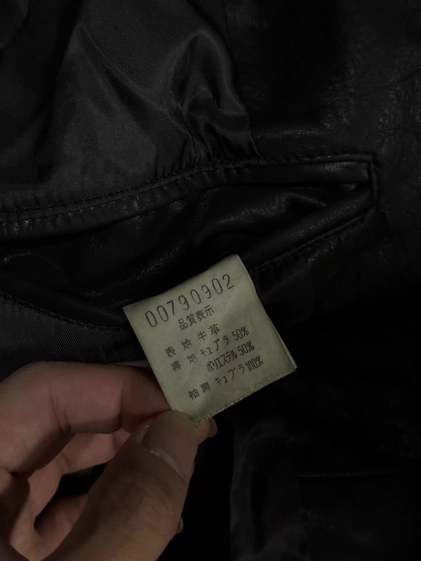 black leather suit coat with vampire style