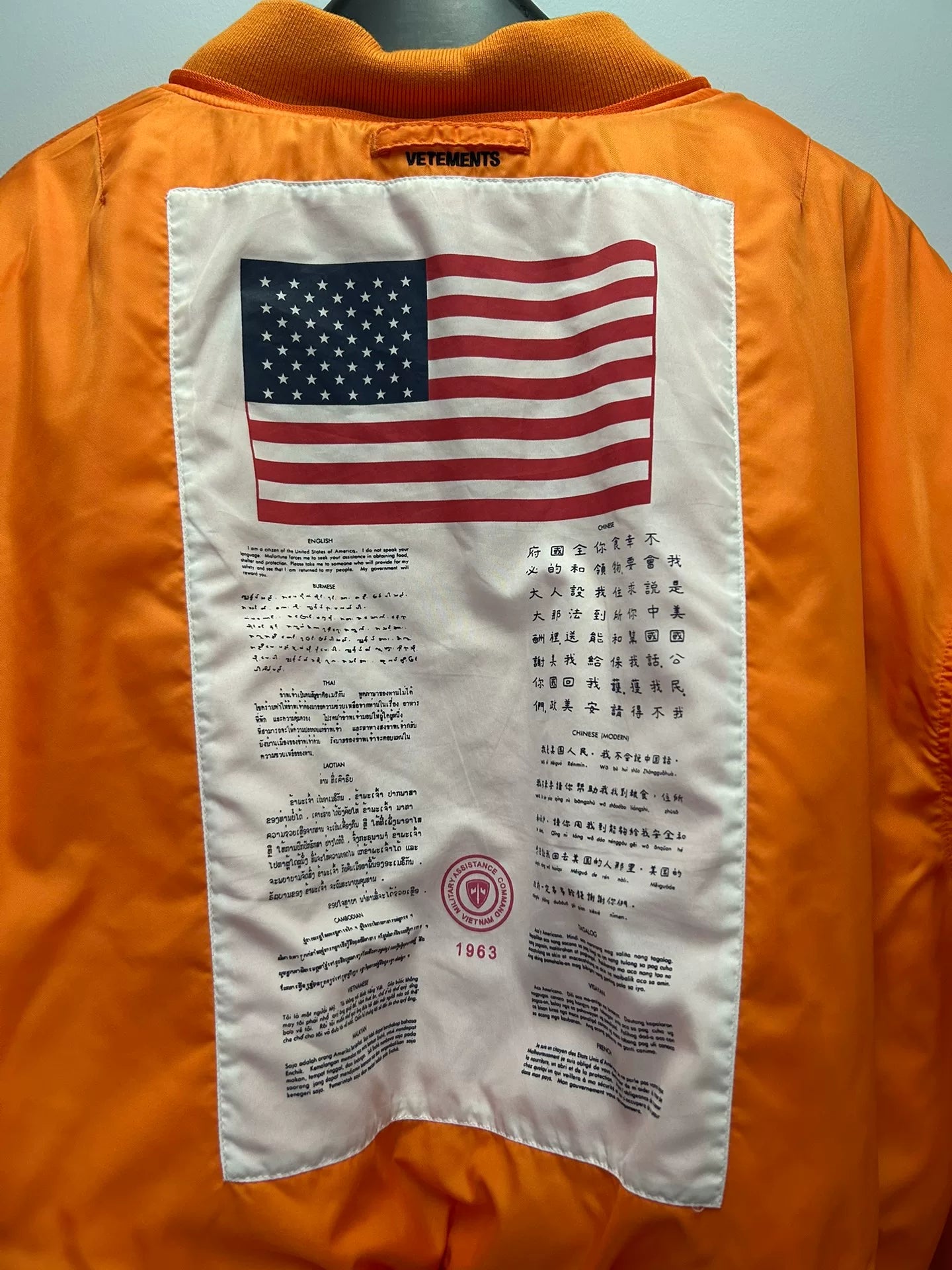 reversible black and orange bomber jacket