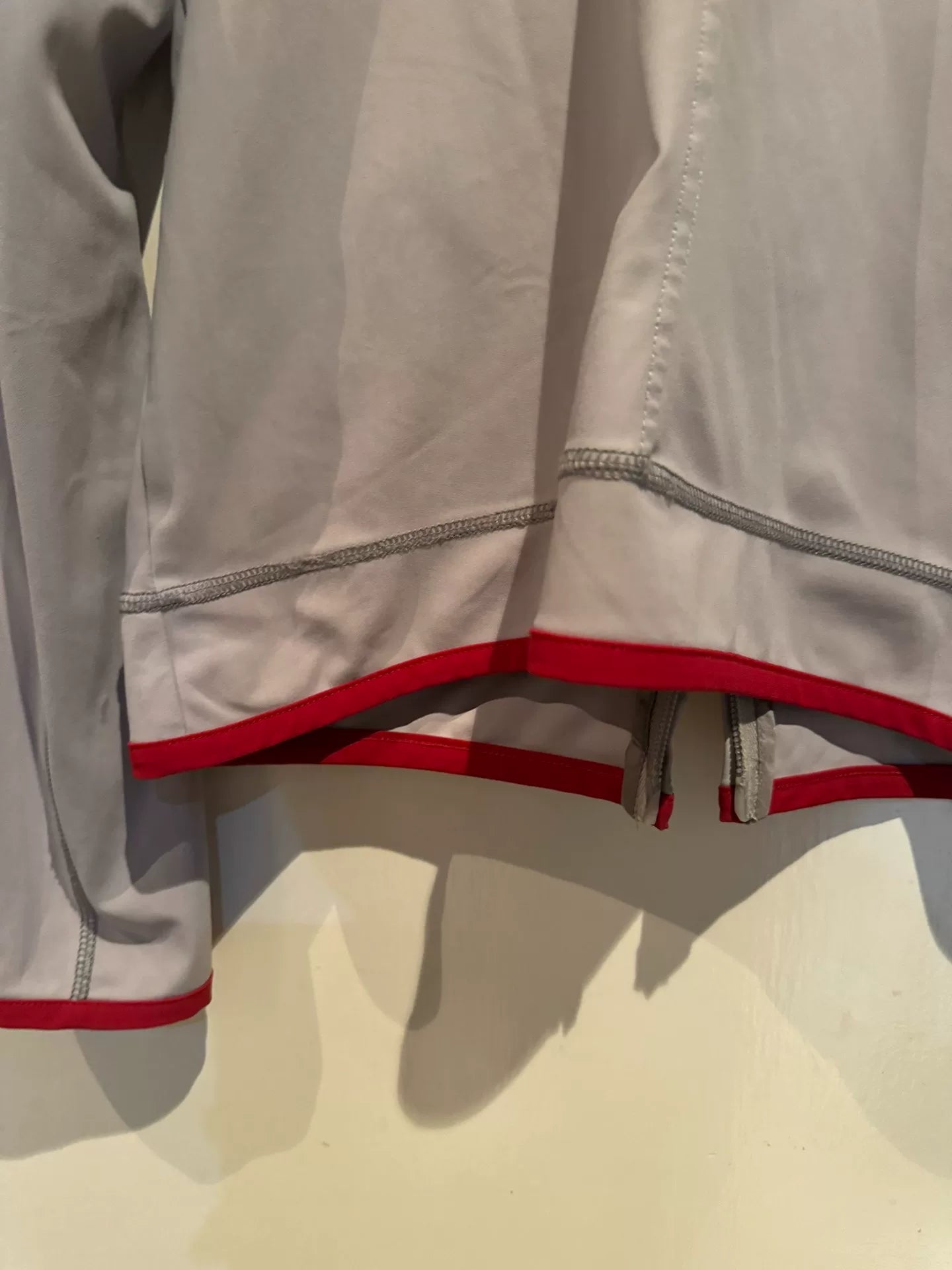 prada sport short jacket with red details