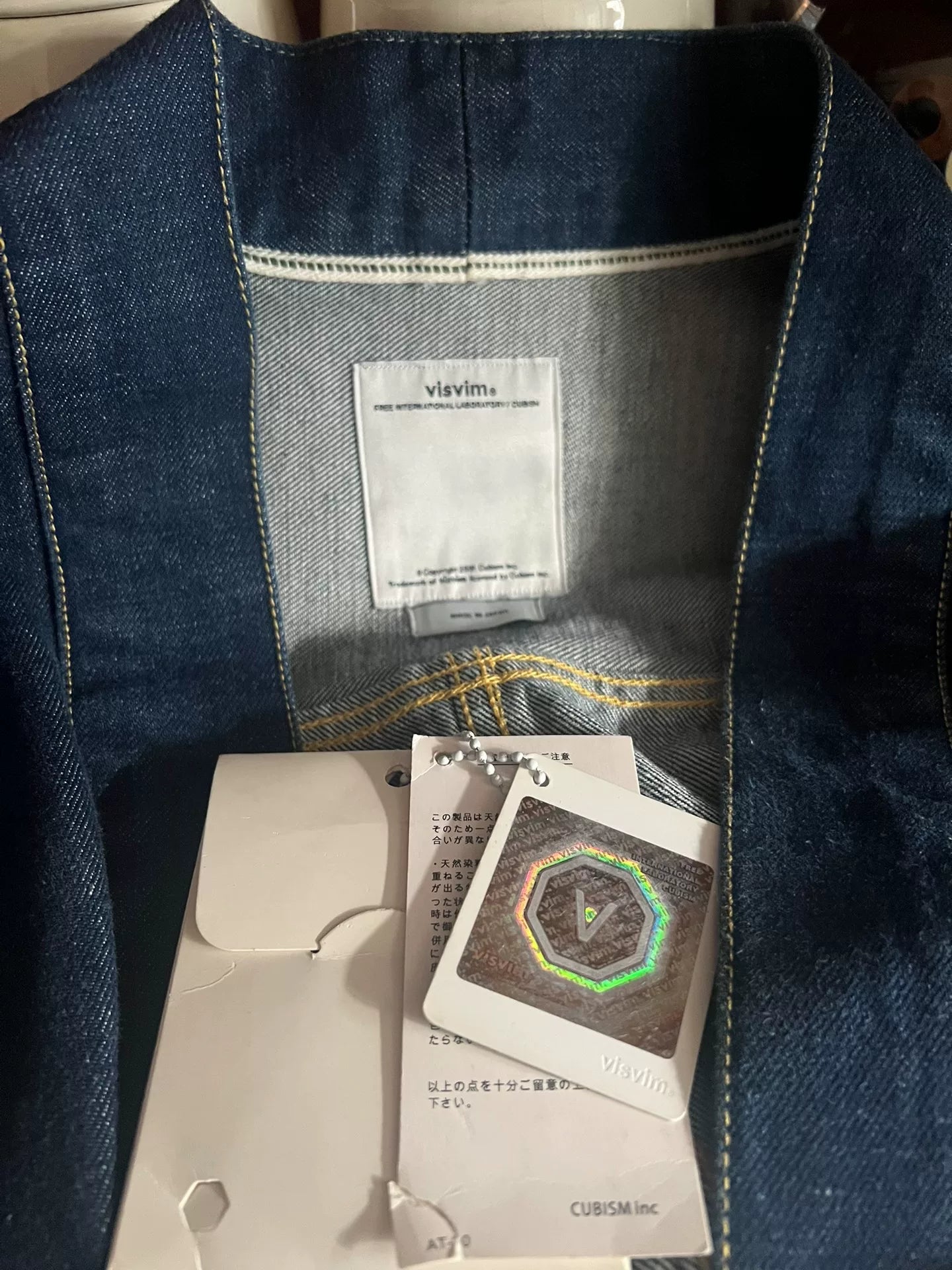 visvim denim jacket with unique buttons