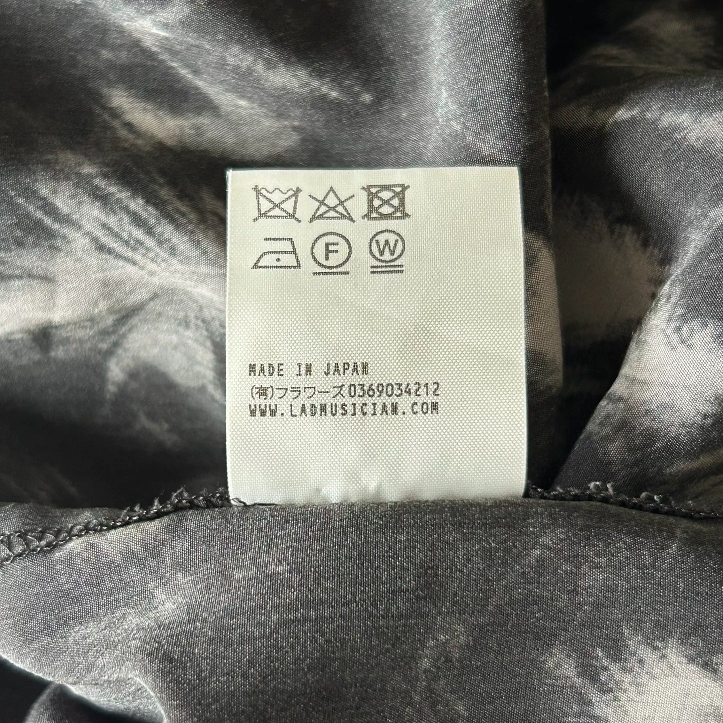 black feather printed shirt by lad musician