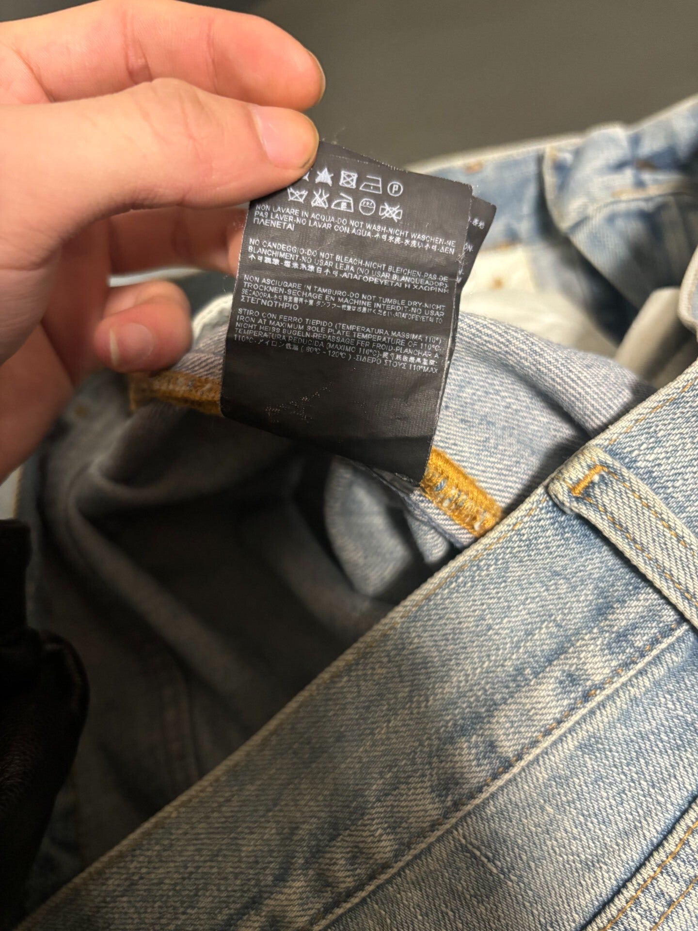 saint laurent ripped knee denim pants