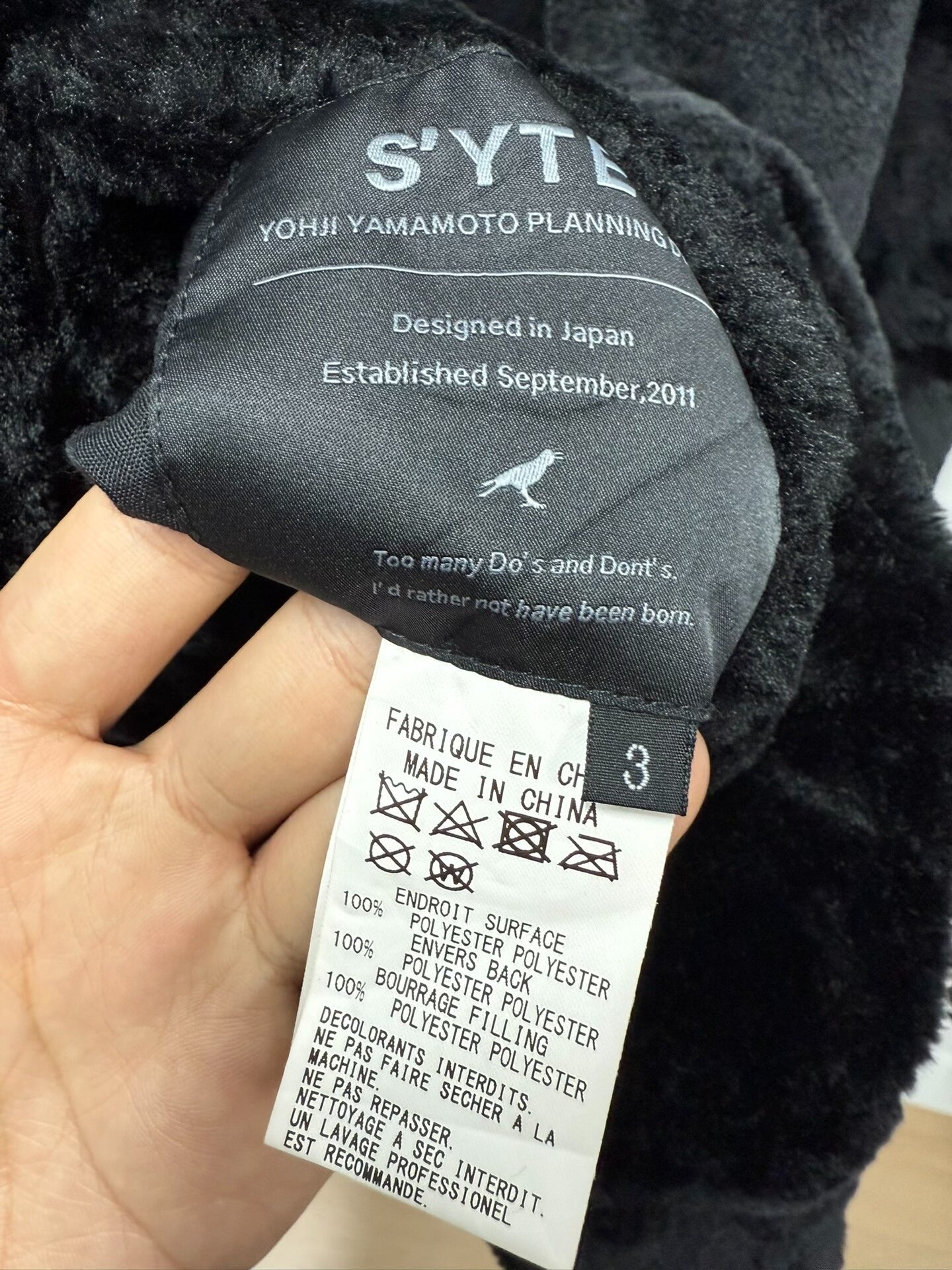 black faux fur jacket by yohji yamamoto