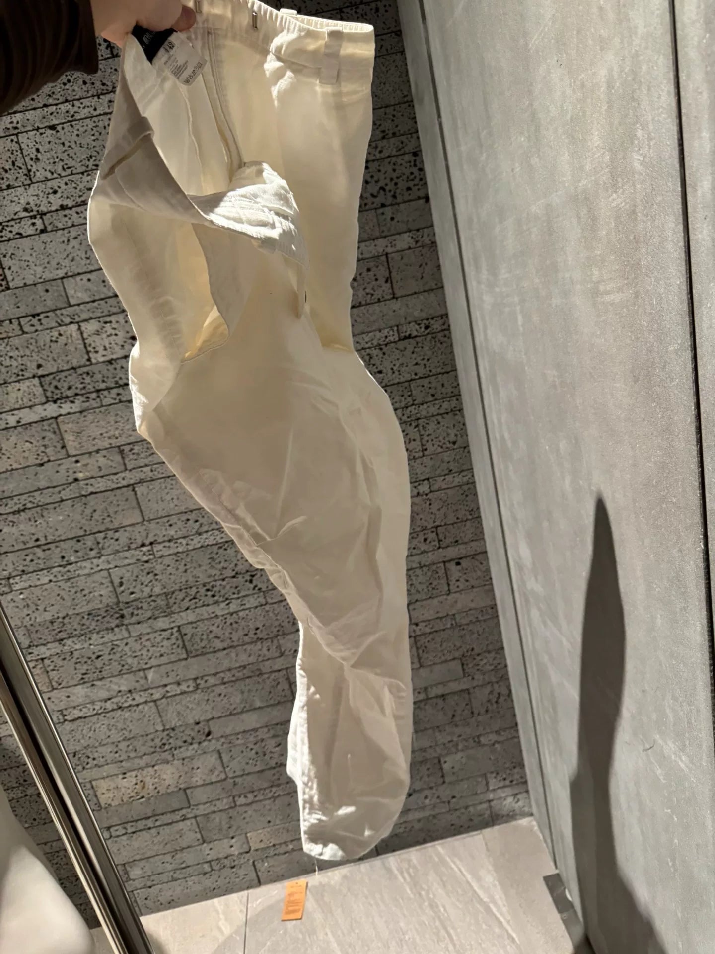 unique white pleated denim trousers