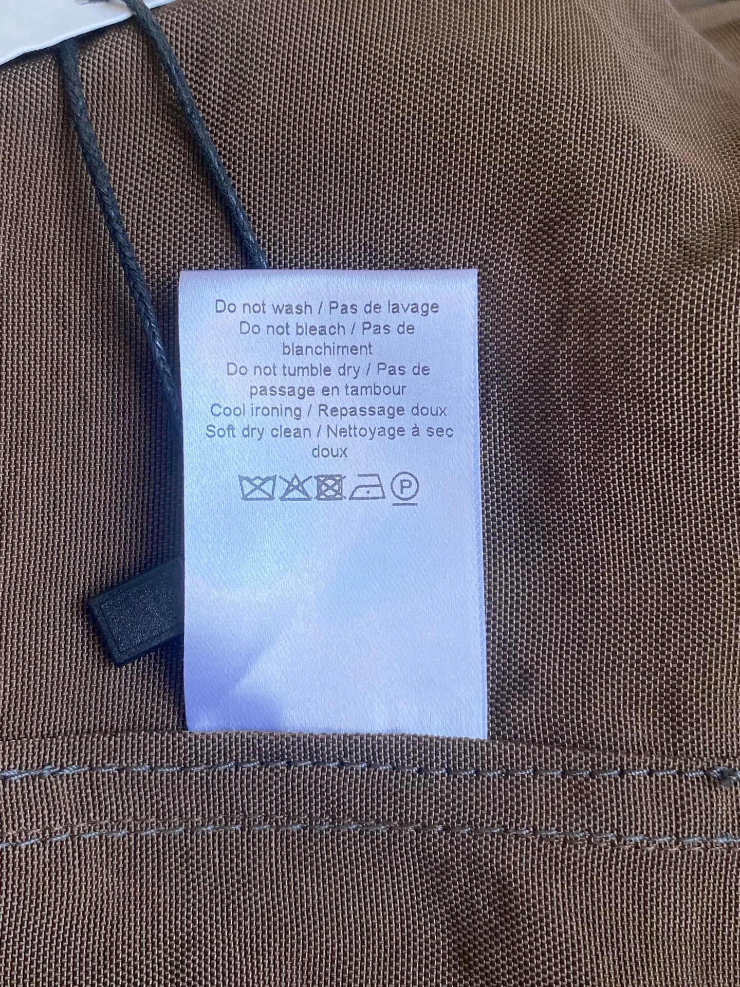 brown belted trench coat with military silhouette