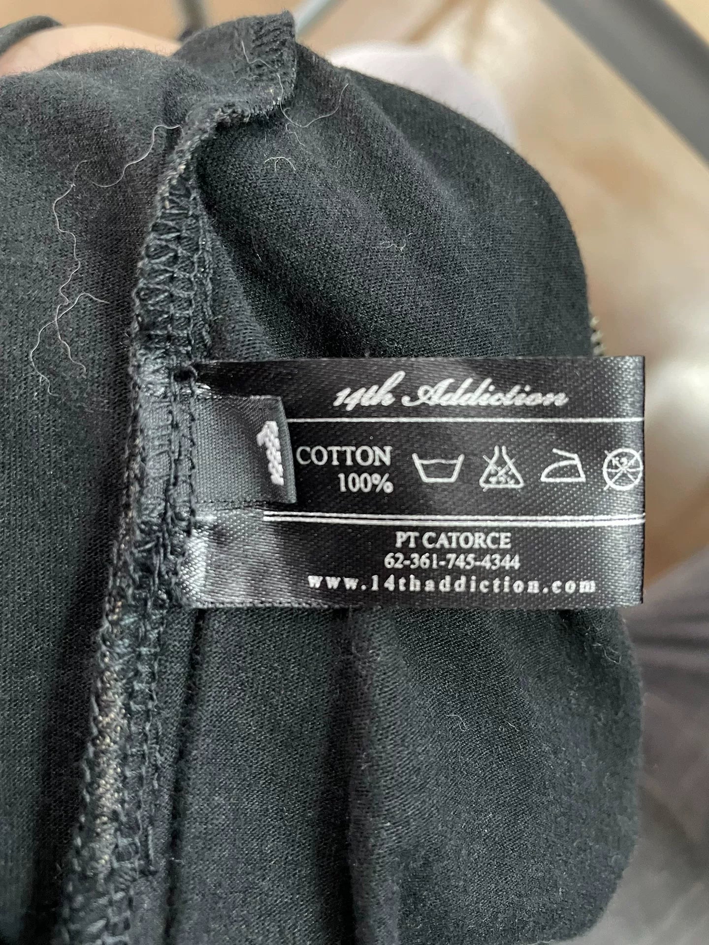 stylish black hooded jacket with unique design