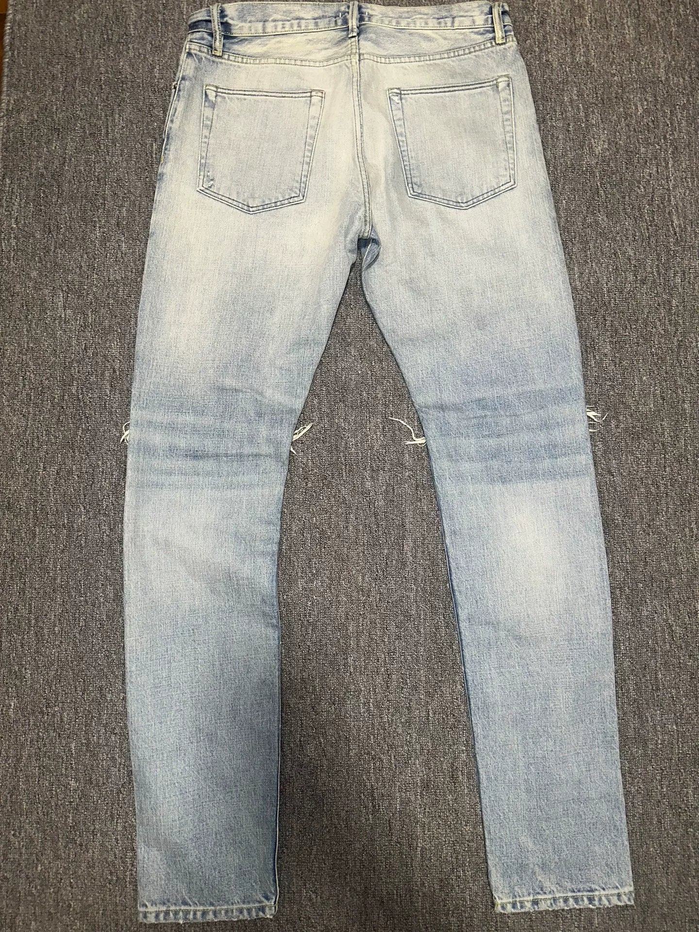 fear of god distressed denim pants