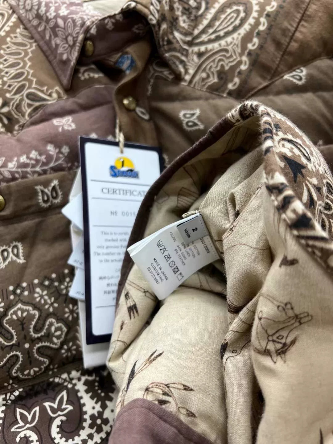 visvim kerchief down jacket in brown