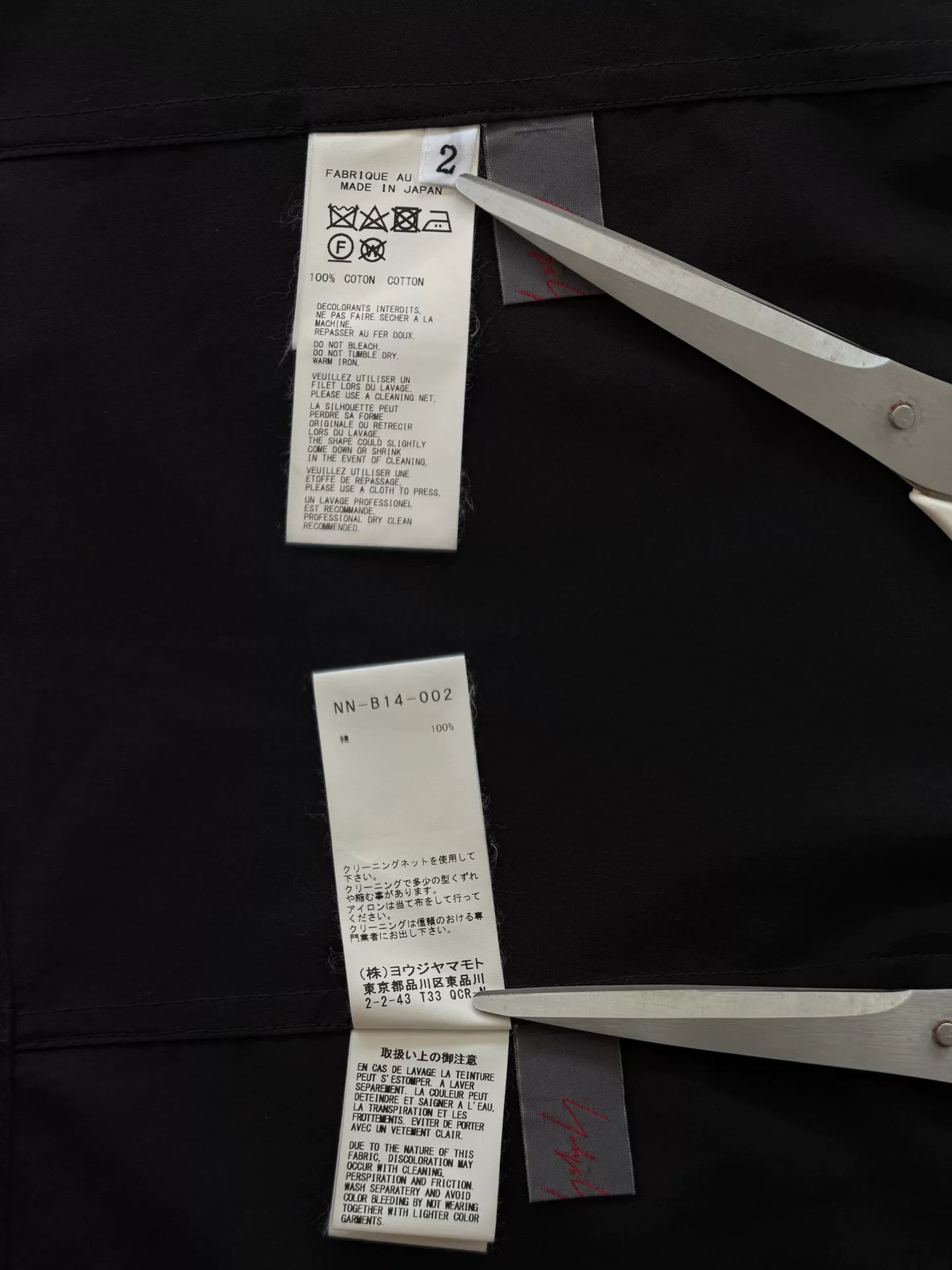 minimalist black shirt with unique collar