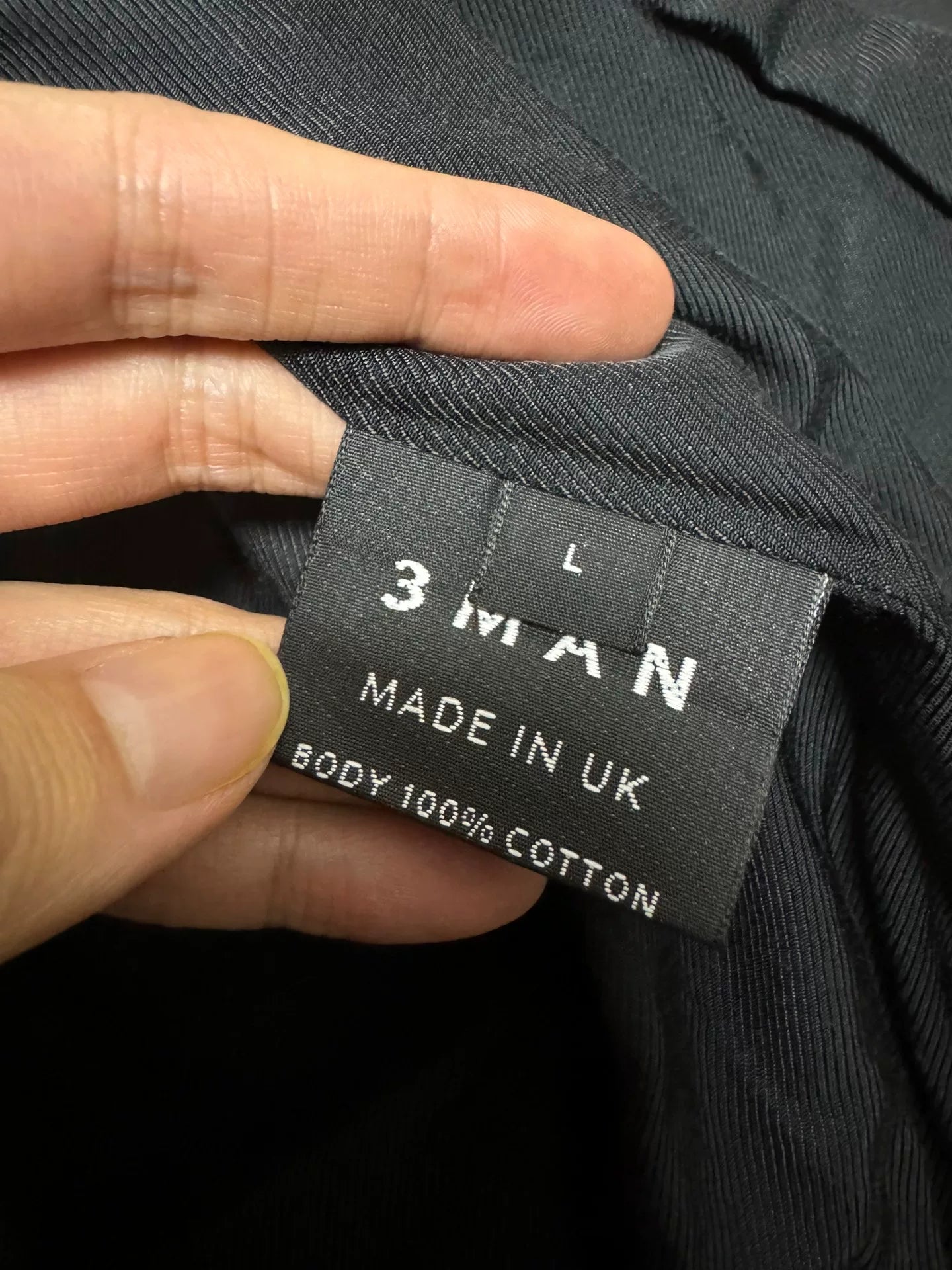 black bomber jacket with diagonal zipper