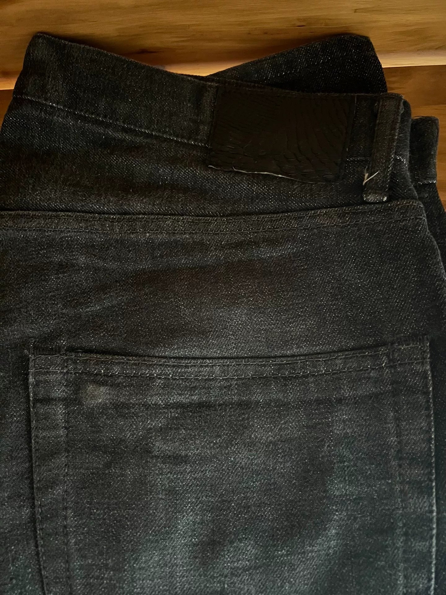 visvim black denim pants with colorful details