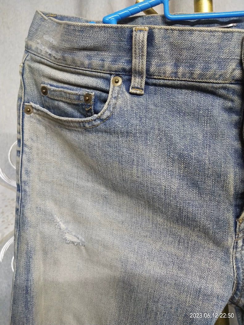 Saint Laurent Distressed Denim Jeans