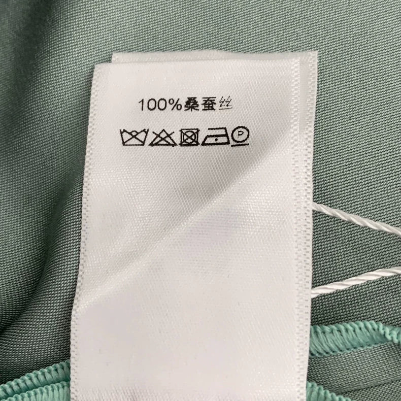 Celine Green V-Neck Sleeveless Dress