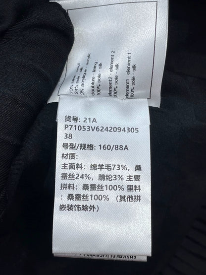 Black Ruffled Velvet Jacket by Chanel