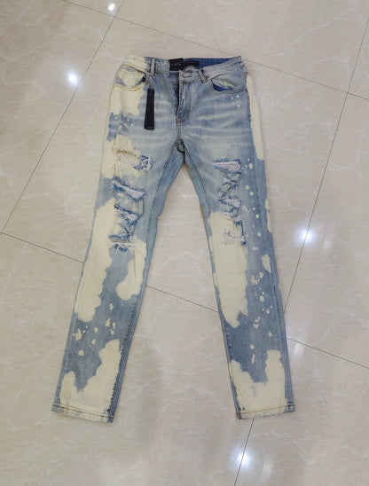 Amiri Splatter Ripped Denim Jeans for Sale