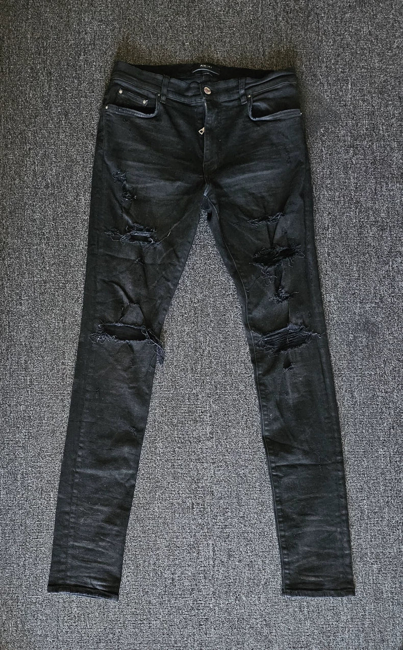 Amiri Distressed Coated Denim Jeans-yf