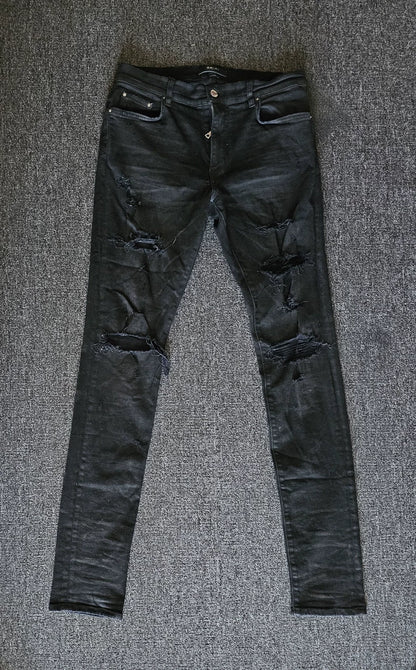 Amiri Distressed Coated Denim Jeans-yf