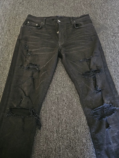 Amiri Distressed Coated Denim Jeans-yf