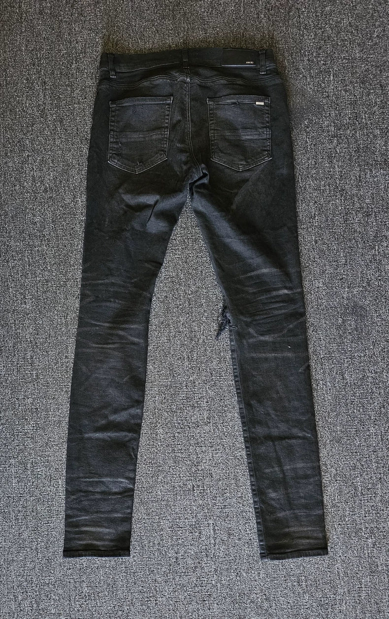 Amiri Distressed Coated Denim Jeans-yf