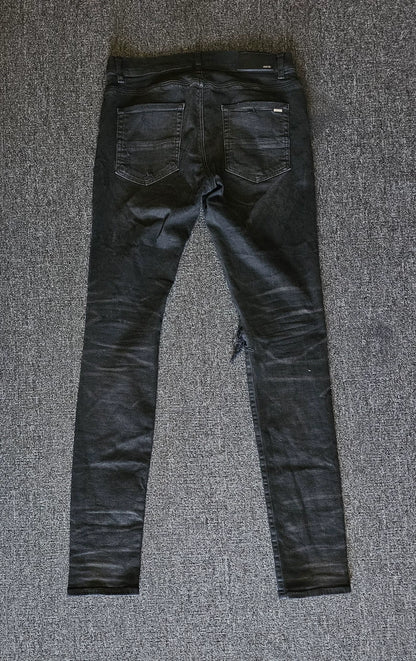 Amiri Distressed Coated Denim Jeans-yf