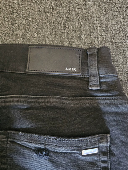Amiri Distressed Coated Denim Jeans-yf