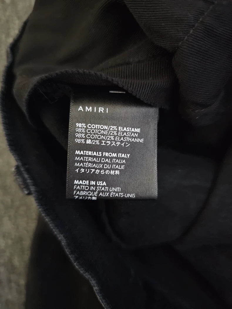 Amiri Distressed Coated Denim Jeans-yf