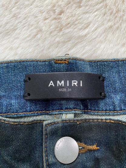Amiri Distressed Denim Jeans in Light Blue