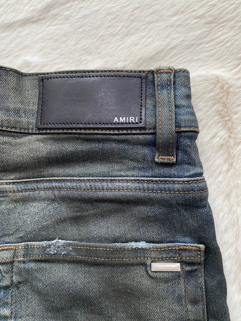 Amiri Distressed Denim Jeans in Light Blue