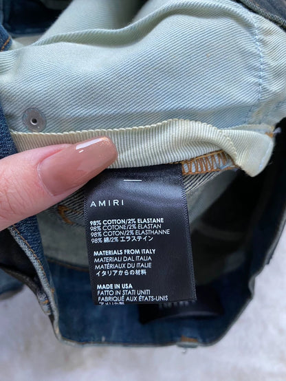 Amiri Distressed Denim Jeans in Light Blue